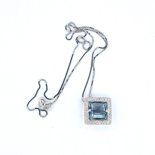 Collier Collier avec pendentif en or blanc 18 K, topaze bleue et diamants 58 Facettes