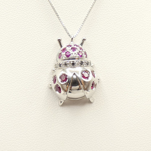 Collier Collier - Pendentif coccinelle en or blanc 18 kt, rubis et diamants noirs 58 Facettes