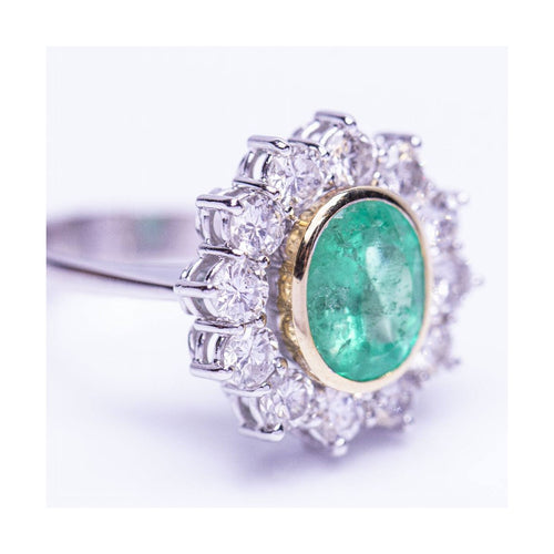 Bague RAINA - Bague en or bicolore 18 ct avec diamants et émeraude 58 Facettes UKD359454EJ
