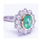 Bague RAINA - Bague en or bicolore 18 ct avec diamants et émeraude 58 Facettes UKD359454EJ