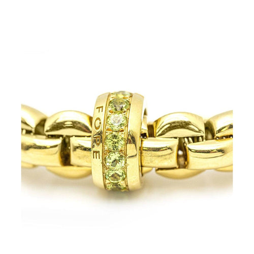 Bracelet FOPE - Bracelet en maille élastique en or jaune 18 kt et péridots 58 Facettes UKD359653LF