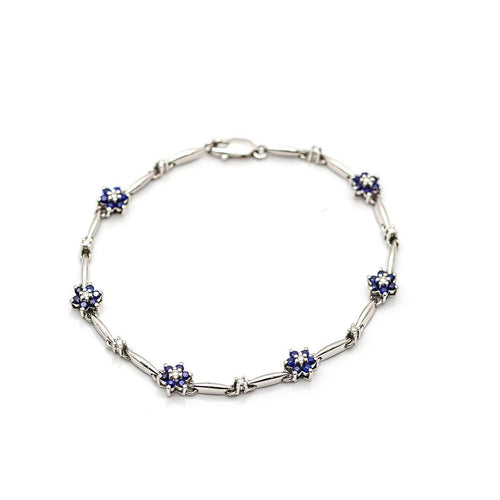 Bracelet SPRING - Bracelet en or blanc 18 kt avec saphirs et diamants 58 Facettes UKD359715LF