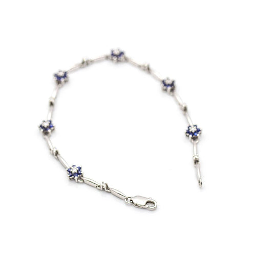 Bracelet SPRING - Bracelet en or blanc 18 kt avec saphirs et diamants 58 Facettes UKD359715LF