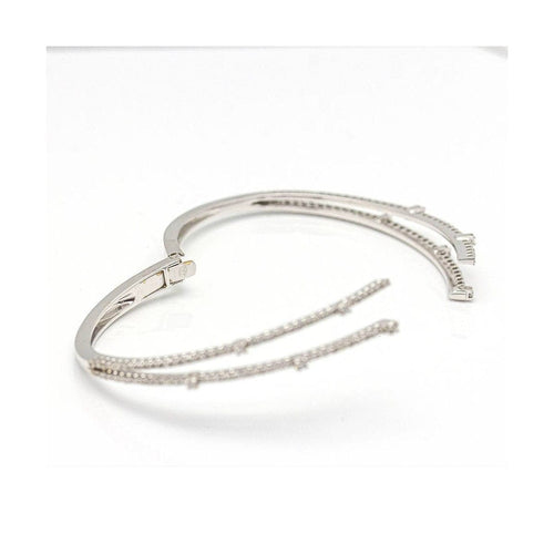 Bracelet RAY - Bracelet rigide en or blanc 18 kt et diamants 58 Facettes UKD359739LF