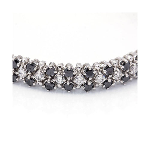 Bracelet NIGHT & DAY - Bracelet rivière en or blanc 18 ct et diamants 58 Facettes UKD359943LF