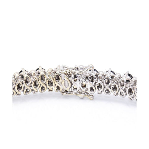 Bracelet NIGHT & DAY - Bracelet rivière en or blanc 18 ct et diamants 58 Facettes UKD359943LF