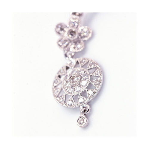 Boucles d'oreilles SUNNY ANTIK - Boucles d'oreilles en or blanc 18 kt et diamants 58 Facettes UKD360396CS