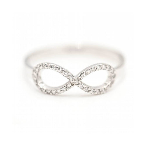 Bague INFINITO - Bague en or blanc 18 kt et diamants 58 Facettes UKD363101CG
