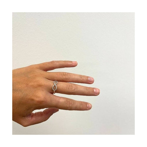 Bague INFINITO - Bague en or blanc 18 kt et diamants 58 Facettes UKD363101CG