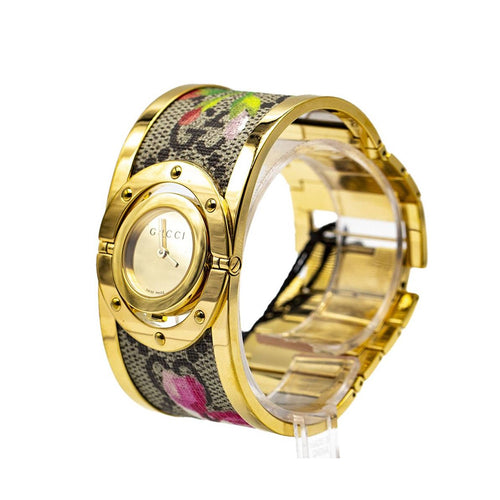 Montre Gucci Twirl Bloom Gold YA112443 - Montre femme en acier doré 58 Facettes UKD363143SO