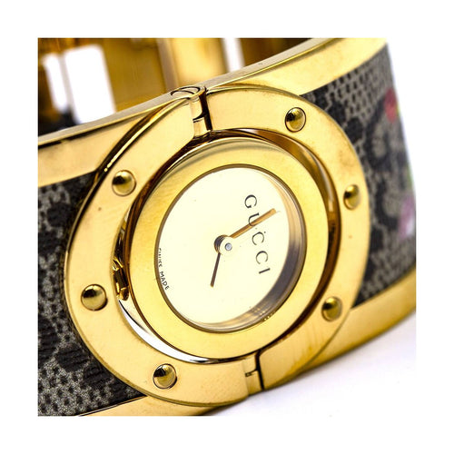 Montre Gucci Twirl Bloom Gold YA112443 - Montre femme en acier doré 58 Facettes UKD363143SO