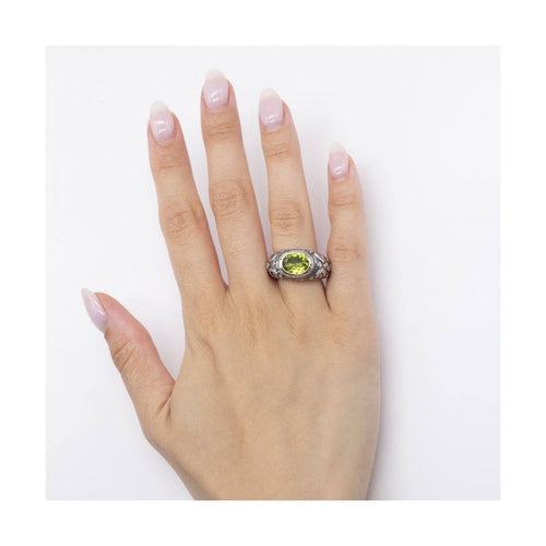 Bague Bague - Or jaune 18K et argent 925 avec péridot 58 Facettes UKD363899SO