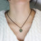 Collier Collier - Pendentif croix 16 tsavorites en or blanc 18K 58 Facettes UKD363907SO