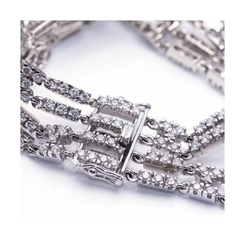 Bracelet Rivière - Bracelet 4 rangs en or blanc 18 kt et diamants 58 Facettes UKD364206LF