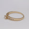 Bague AMOUR - Bague demi-alliance en or jaune 18K et diamants 58 Facettes UKD364358CH