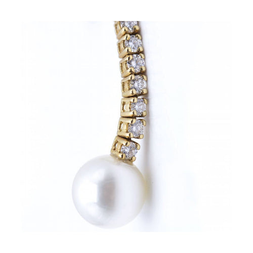 Boucles d'oreilles Boucles d’oreilles pendantes en or jaune 18 kt, diamants et perles 58 Facettes UKN102861LF