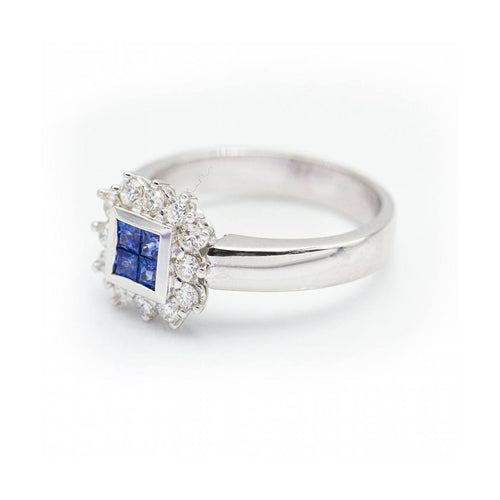 Bague MONACO - Bague en or blanc 18 kt avec diamants et saphirs 58 Facettes UKN102896AS