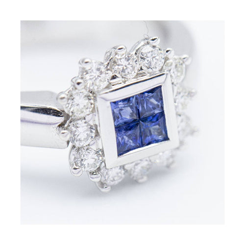 Bague MONACO - Bague en or blanc 18 kt avec diamants et saphirs 58 Facettes UKN102896AS