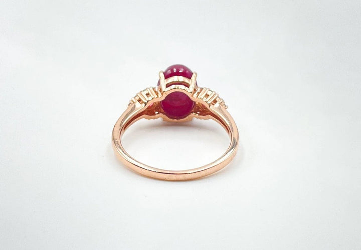 Bague 55 Bague en or rose avec rubis, grenats et diamants 58 Facettes