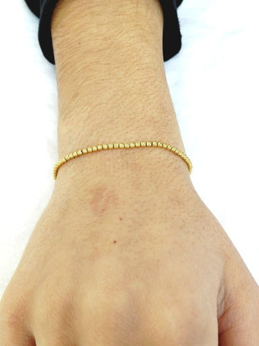 Bracelet Bracelet perlé en or jaune 18 carats 58 Facettes 1717142