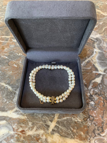 Bracelet Bracelet 2 rangs de perles en or jaune 18 carats 58 Facettes