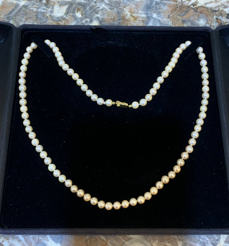Collier Collier de perles 60,5 cm en or jaune 18 carats 58 Facettes C177