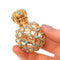 Flacon de parfum victorien français en or orné d'un treillis turquoise, vers 1860 58 Facettes 26050-0271