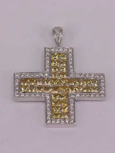 Pendentif Pendentif croix en or blanc, diamants et saphirs jaunes 58 Facettes 1729