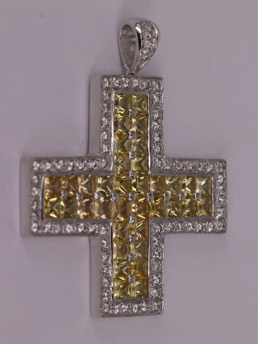Pendentif Pendentif croix en or blanc, diamants et saphirs jaunes 58 Facettes 1729