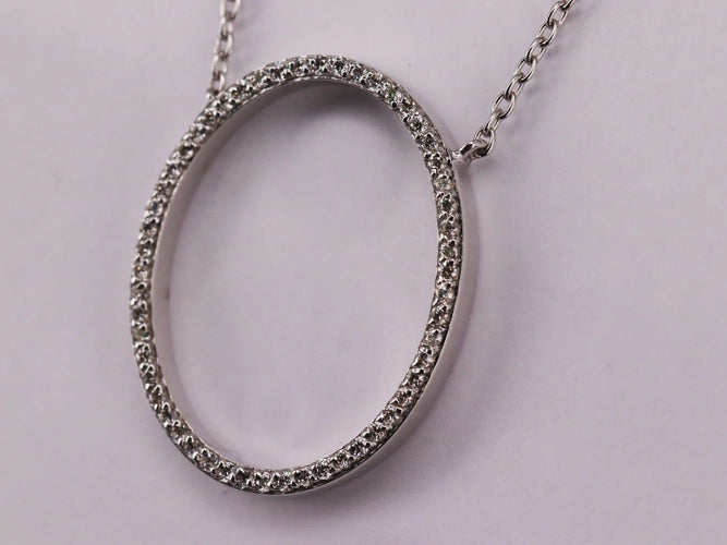 Collier Collier pendentif ovale en or blanc et diamants 58 Facettes NECK32