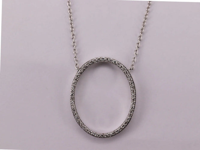 Collier Collier pendentif ovale en or blanc et diamants 58 Facettes NECK32
