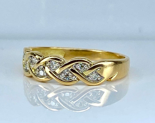 Bague 50 Bague en or jaune 18 carats sertie de diamants 58 Facettes AB680