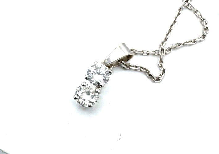 Collier Collier avec pendentif en or blanc et diamants 1 carat 58 Facettes 260020