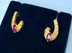 Boucles d'oreilles Boucles d’oreilles - Or jaune 18 carats, diamants et pierres rouges 58 Facettes AB681