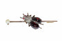 Broche Broche victorienne française en forme de barrette ornée d'un scarabée serti de grenats, de rubis et de diamants 58 Facettes 26050-0148