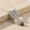 Collier Collier en or blanc 18 carats, diamants et perles 58 Facettes 1695