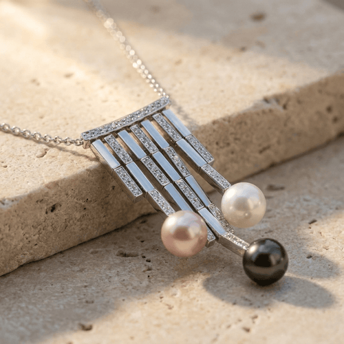 Collier Collier en or blanc 18 carats, diamants et perles 58 Facettes 1695