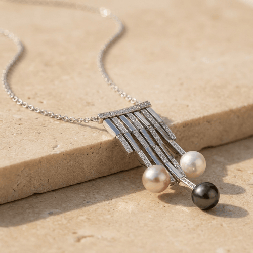 Collier Collier en or blanc 18 carats, diamants et perles 58 Facettes 1695
