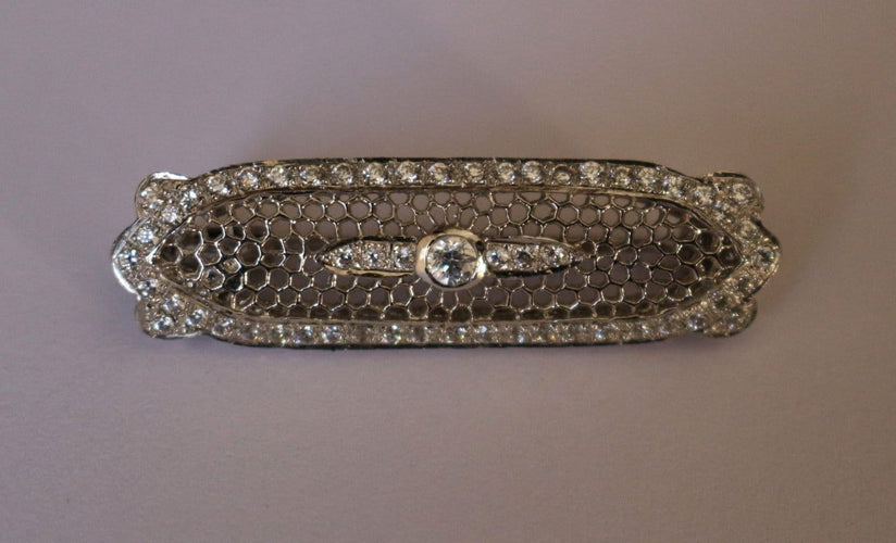 Broche Broche-barrette Art déco en or blanc 18 carats et diamants 58 Facettes 603