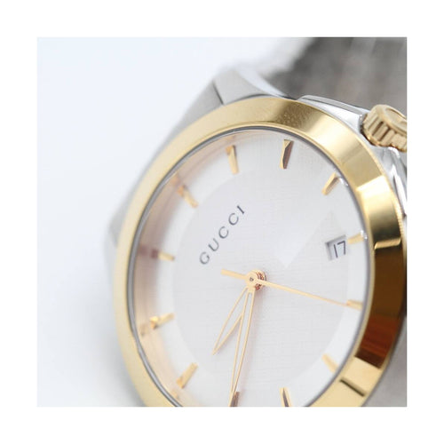 Montre Gucci G-Timeless YA126409 - Montre en acier et plaqué or 58 Facettes UKD363865FJ