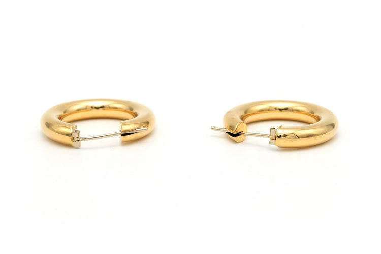 Boucles d'oreilles Boucles d'oreilles créoles contemporaines en or jaune 18 carats 58 Facettes B664
