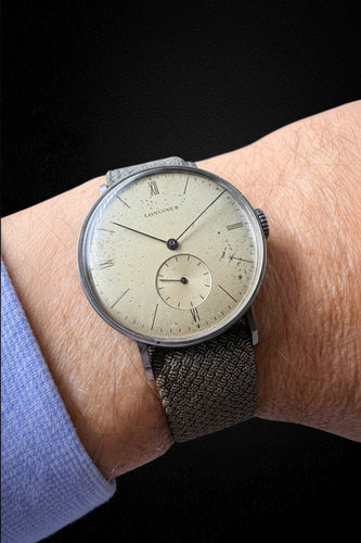 Montre Longines - Montre années 1930 en acier à remontage manuel 58 Facettes