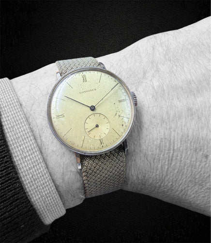Montre Longines - Montre années 1930 en acier à remontage manuel 58 Facettes