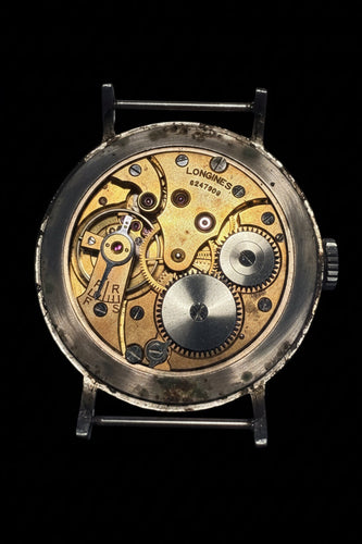 Montre Longines - Montre années 1930 en acier à remontage manuel 58 Facettes