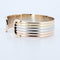 Bracelet Cartier - Bracelet jonc ouvert Double C en or jaune 18 carats 58 Facettes 73524