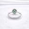 Bague 54 Bague marguerite en or blanc 18 carats, émeraudes et diamants 58 Facettes Bague marguerite en or émeraudes et diamants
