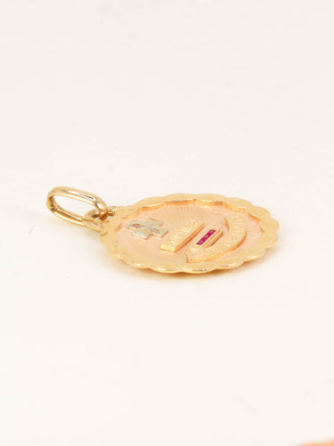 Pendentif AUGIS Médaille Amour ronde Plus Hier Moins Demain or jaune rubis 58 Facettes 1164.3