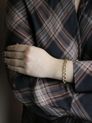 Bracelet ROLLANG & Cie Bracelet chaîne maillons ovales or jaune - Années 1970 58 Facettes 0009