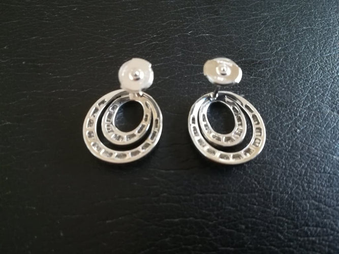 Boucles d'oreilles Boucles d’oreilles - Cercles en or blanc 18 ct et diamants baguette 58 Facettes 01345