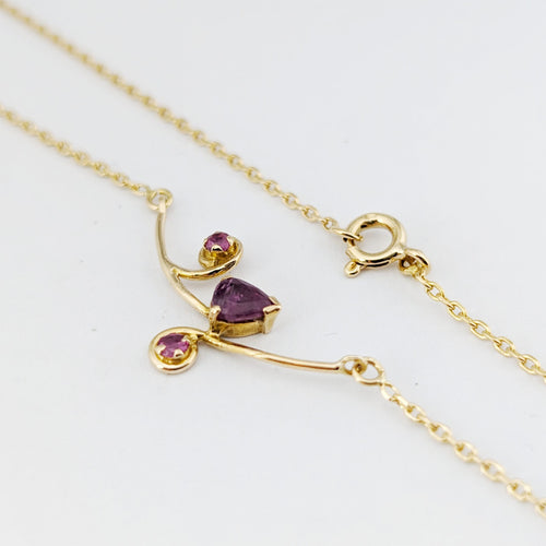 Collier Collier - Pendentif floral en or jaune 18 carats et rubis 58 Facettes 32891